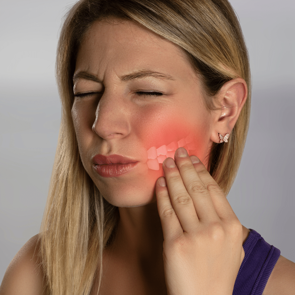 woman experiencing a toothache.